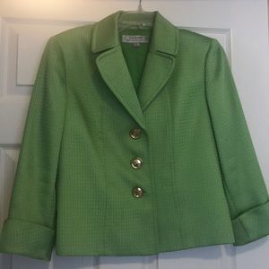 Vivid green jacket with gold buttons